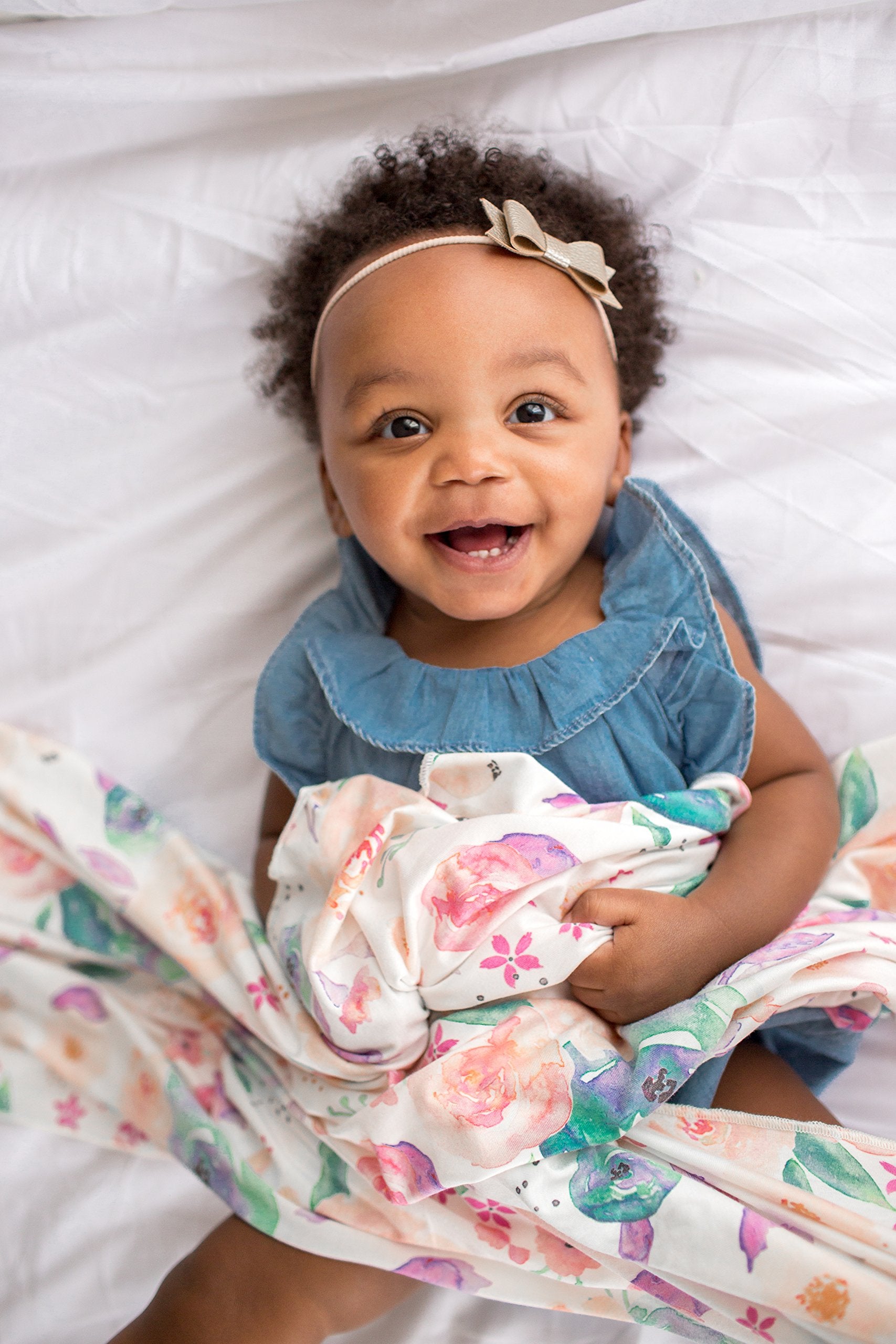 Copper Pearl Floral Bloom swaddle on baby during naptime emphasizes breathable, cozy feel.