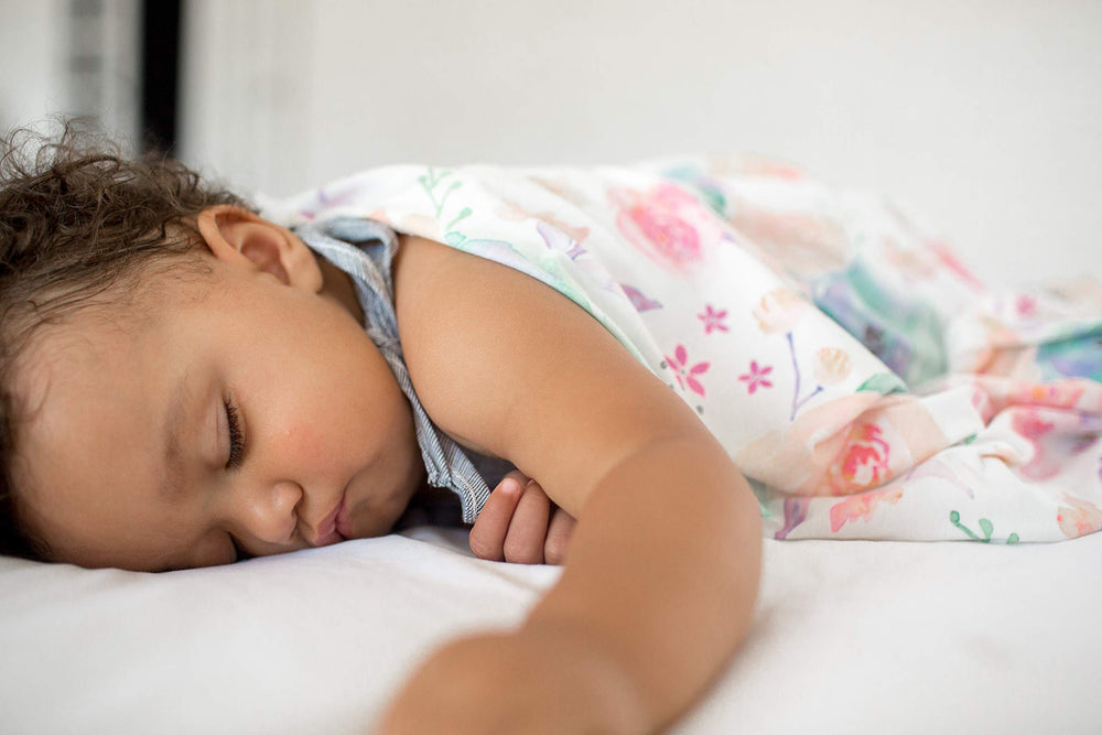 Copper Pearl Floral Bloom swaddle knit detail underscores durability and stretch.