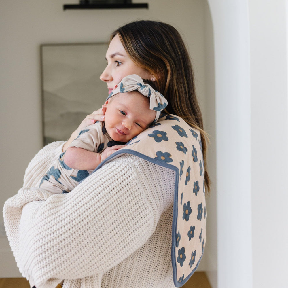 Copper Pearl Gemma tan burp cloth middle fleece layer delivers strong absorbency for mess management.