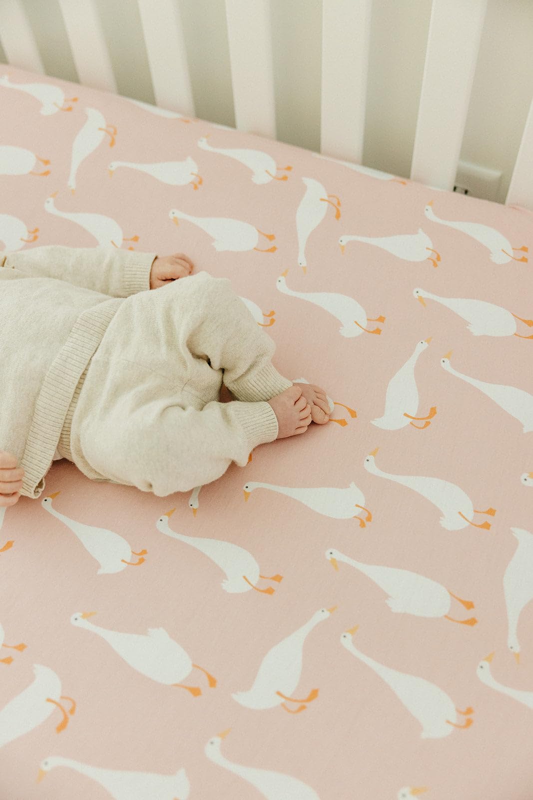 Copper Pearl Goosie crib-sheet coordination with CP products creates a cohesive nursery look.
