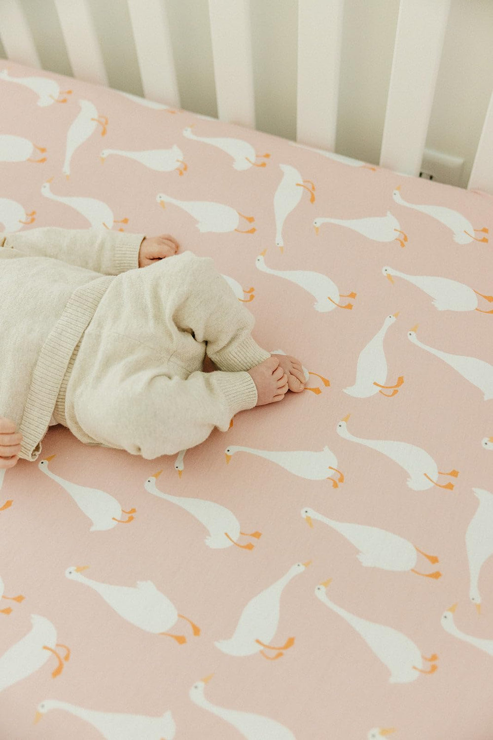 Copper Pearl Goosie crib-sheet coordination with CP products creates a cohesive nursery look.