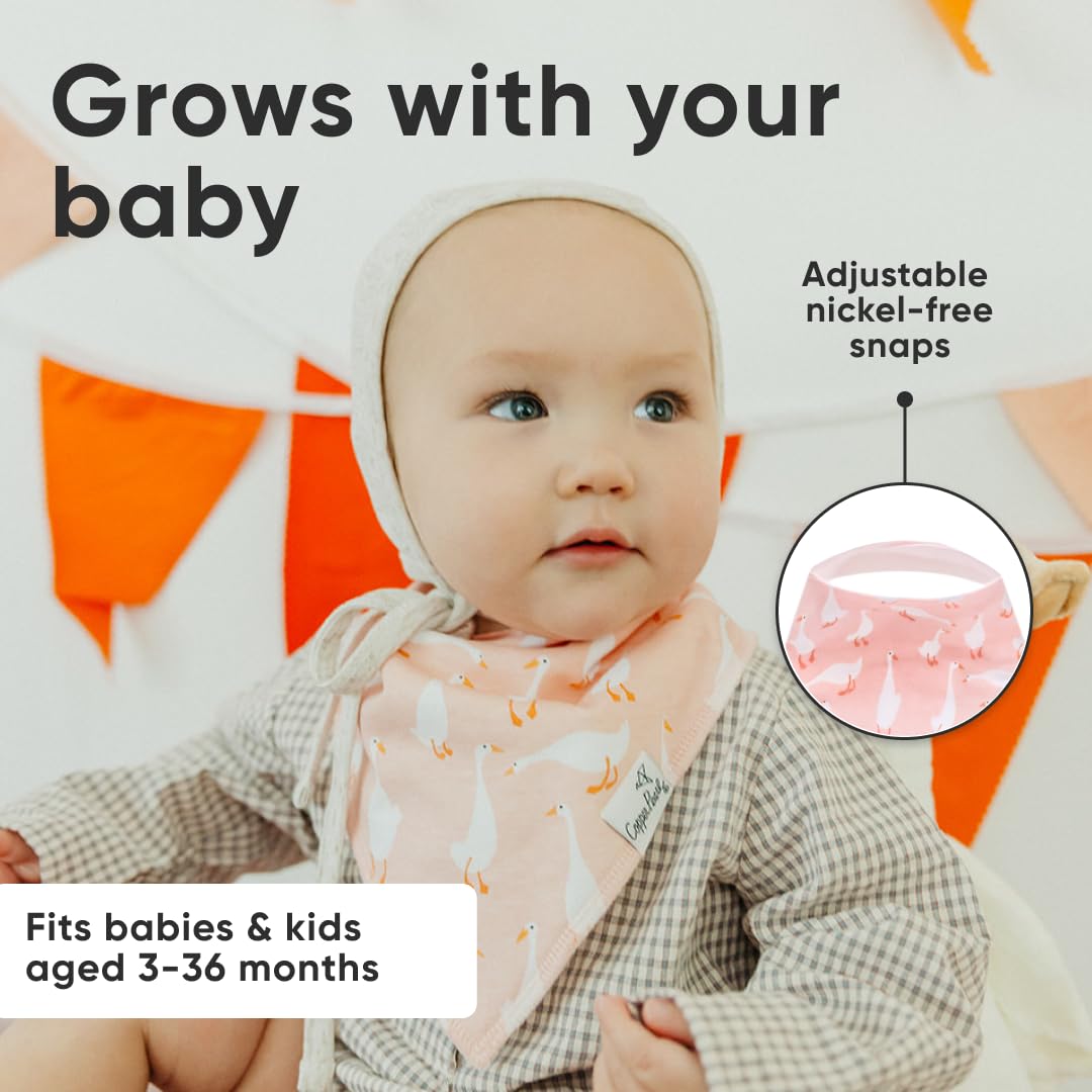 Copper Pearl Goosie prints fashion-forward bibs displayed with outfits for stylish everyday wear.