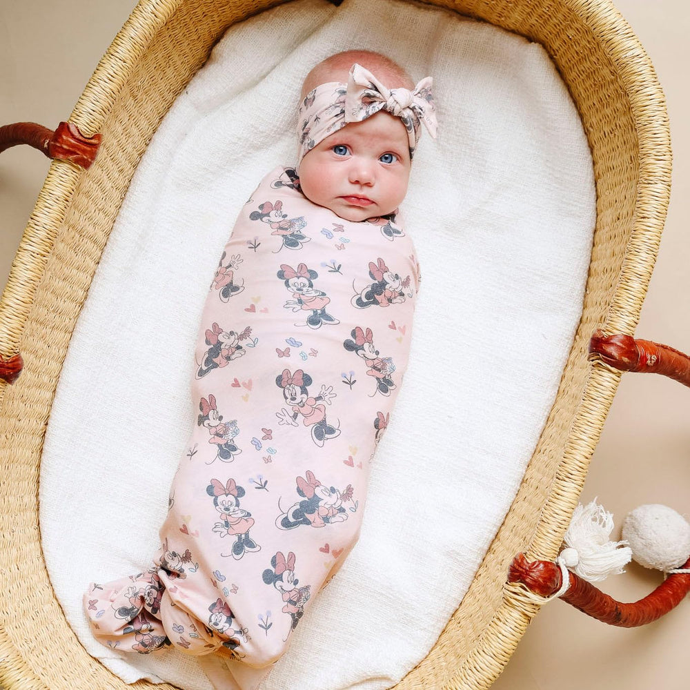 Copper Pearl stretchy fabric headband shows comfort and flexibility for a growing baby.