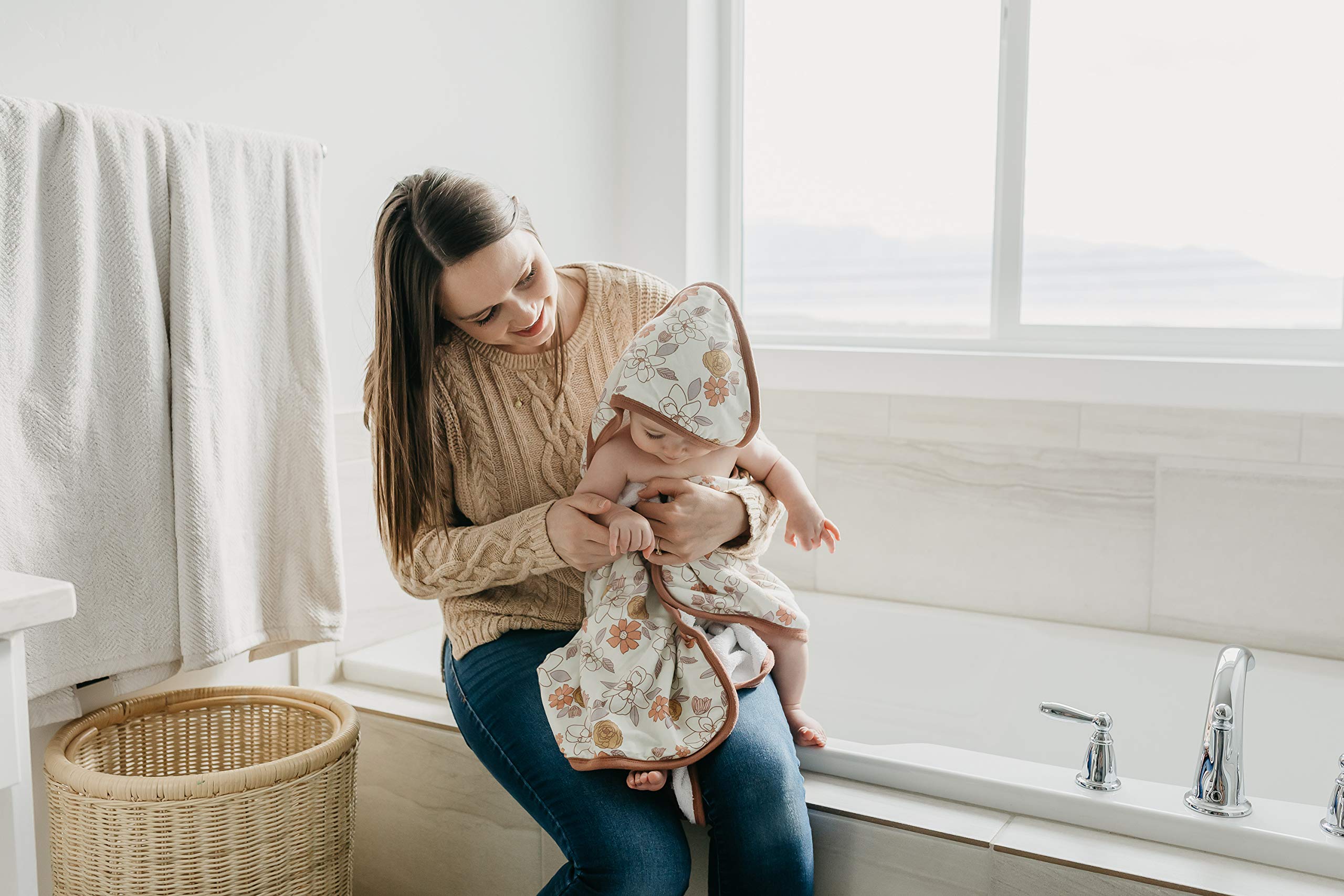 Copper Pearl hooded towel Ferra nursery-use closeup demonstrates cozy bath time ritual for baby