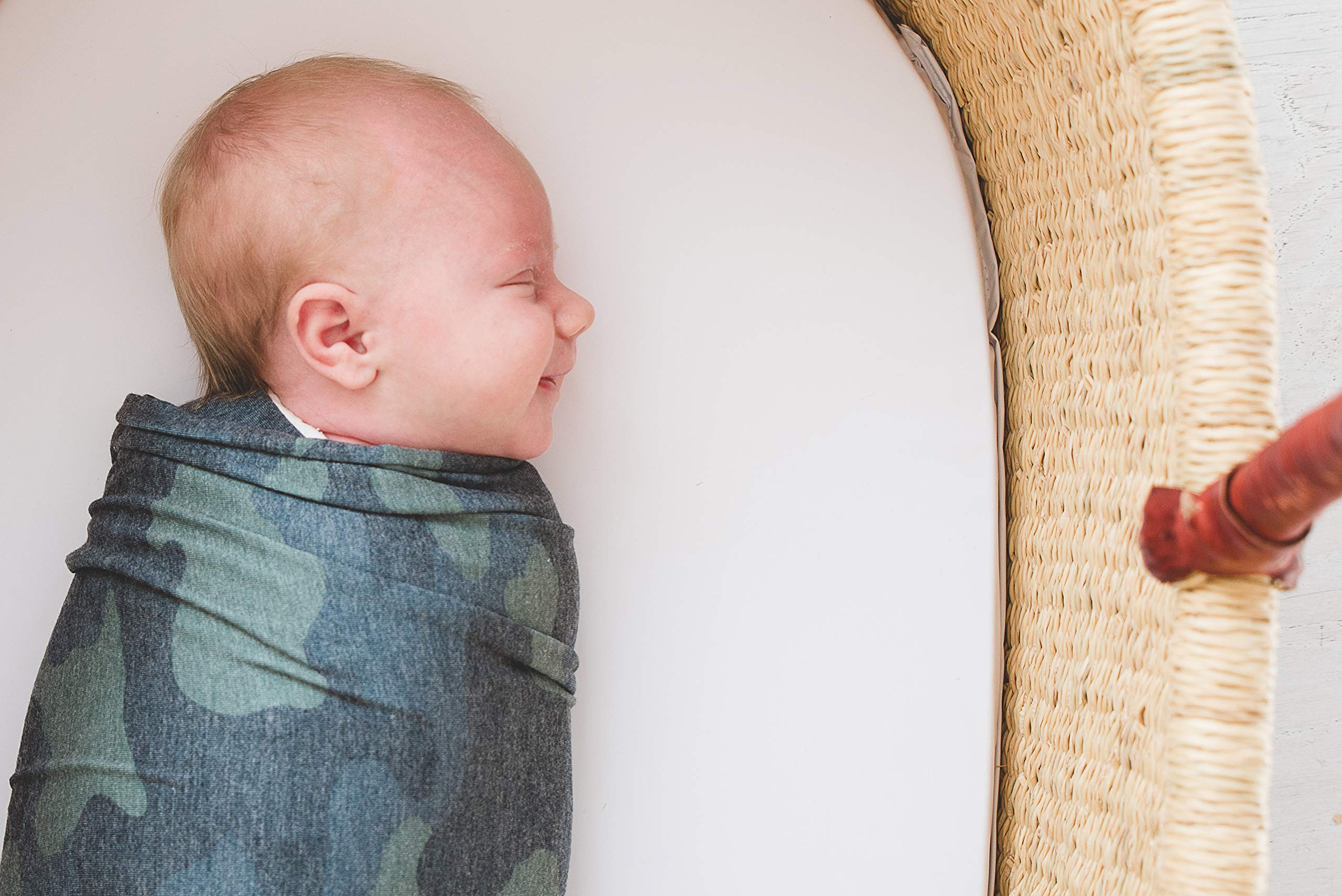 Copper Pearl Hunter swaddle blanket being gifted at baby shower.