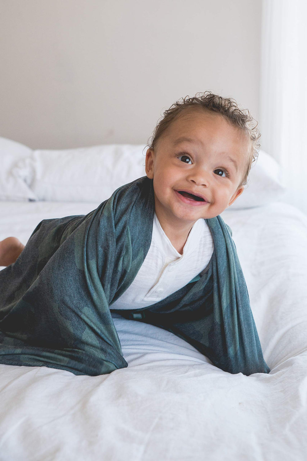 Copper Pearl Hunter swaddle blanket print matches other gear for coordinated baby outfits.
