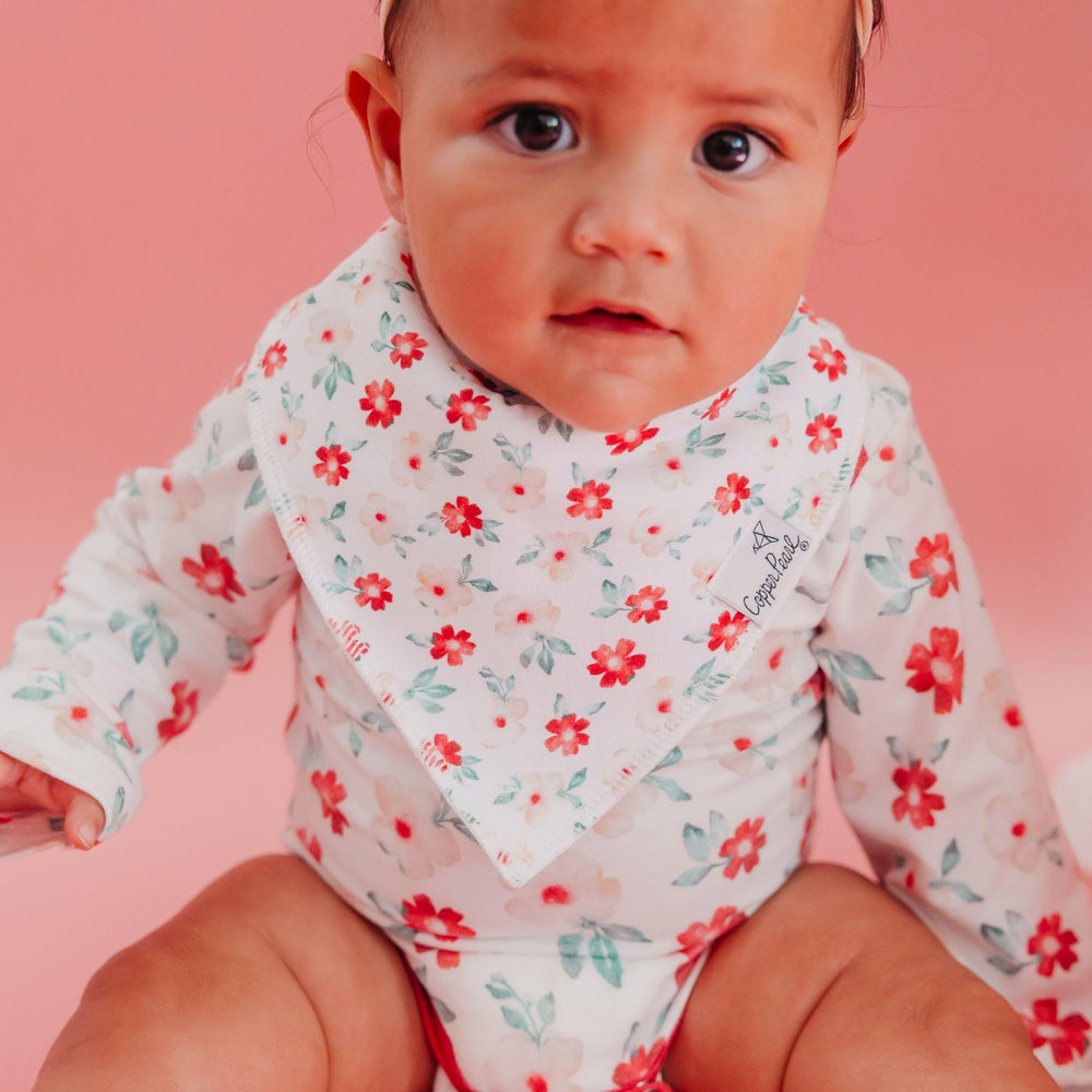 Copper Pearl Juliet Bandana Bib Set adjustable snaps demonstrate easy fit for ages 3–24 months.
