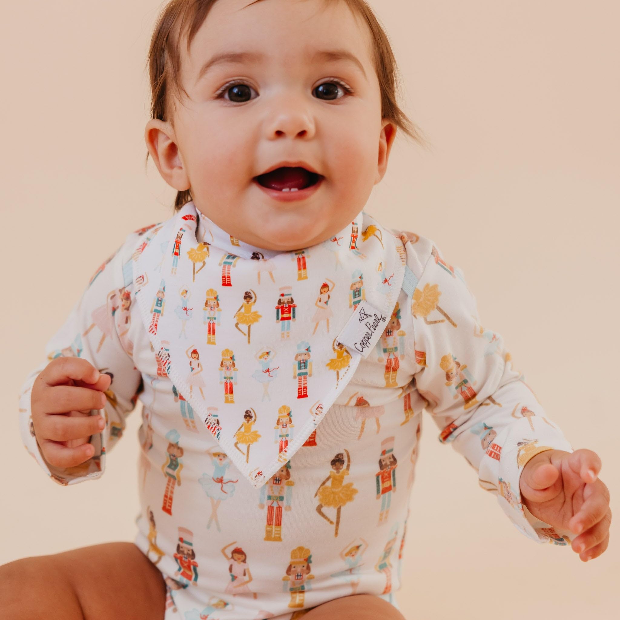 Copper Pearl Juliet Bandana Bib Set outfit styling demonstrates fashion-forward baby look.