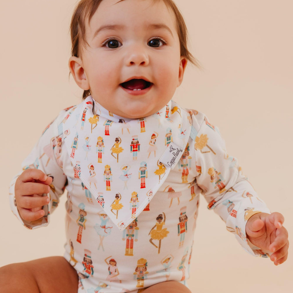 Copper Pearl Juliet Bandana Bib Set outfit styling demonstrates fashion-forward baby look.