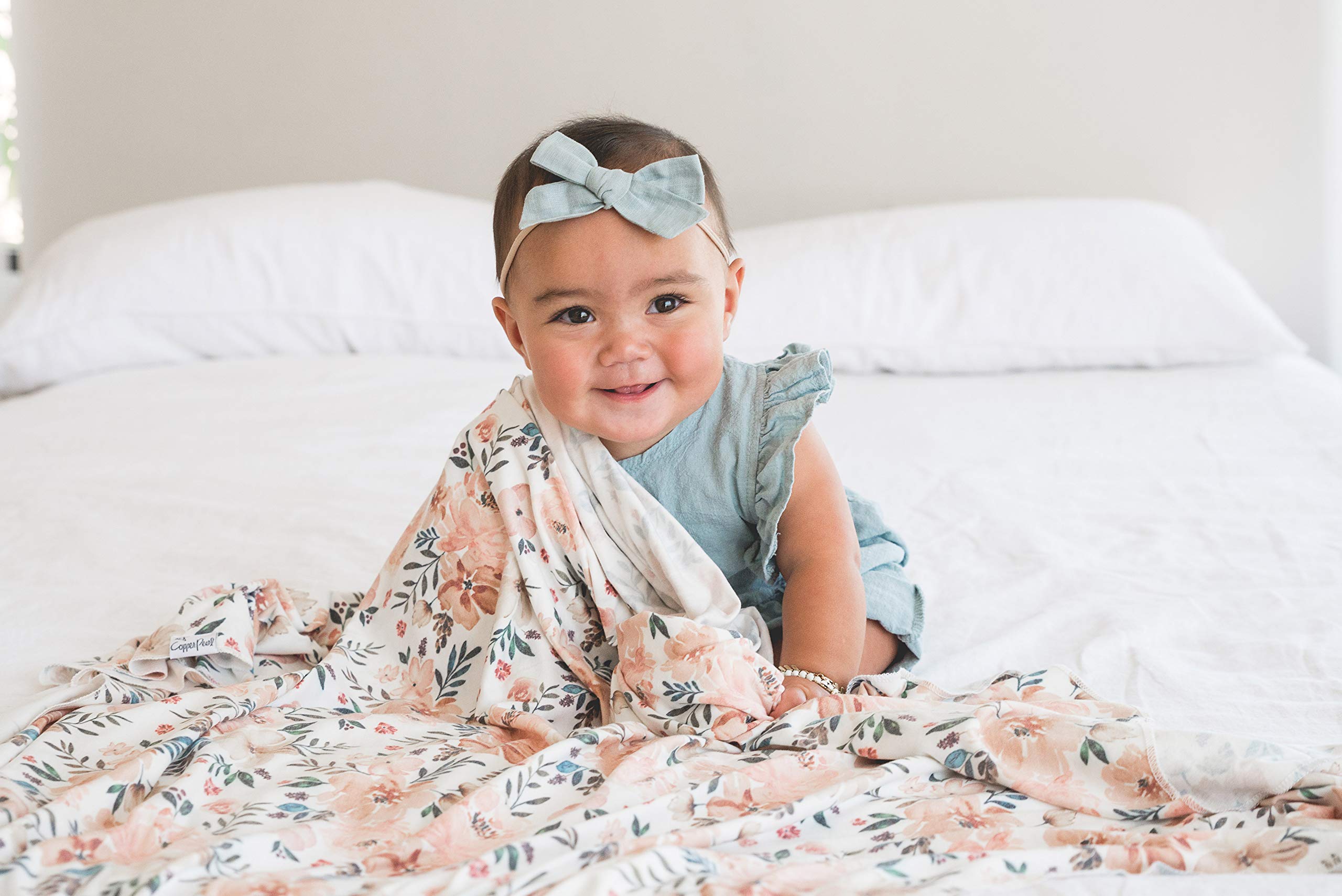 Copper Pearl Large Knit Swaddle Autumn pattern adds stylish nursery decor and cozy coverage.