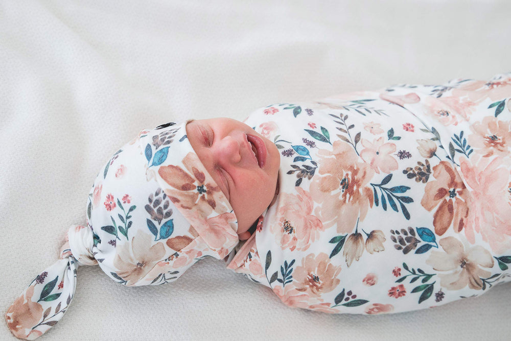 Copper Pearl Large Knit Swaddle Autumn grows with baby, offering continued comfort into toddler years.