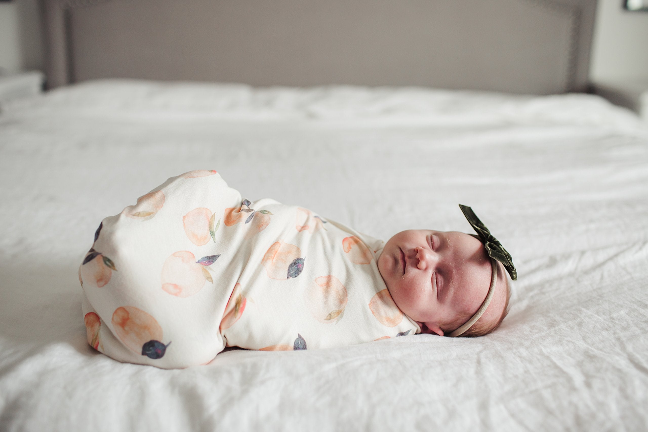 Copper Pearl Large Premium Knit Swaddle Caroline lightweight fabric, ideal for travel and on-the-go use.