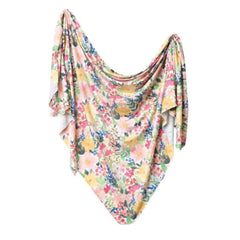 Copper Pearl swaddle blanket Lark design laid flat highlights breathable fabric and versatile use.