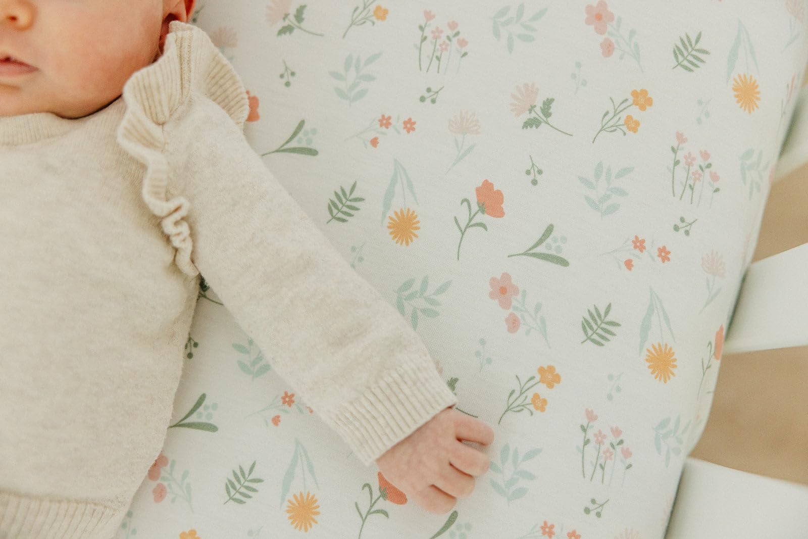 Copper Pearl Mabel crib sheet with reinforced elastic edge for a secure fit.