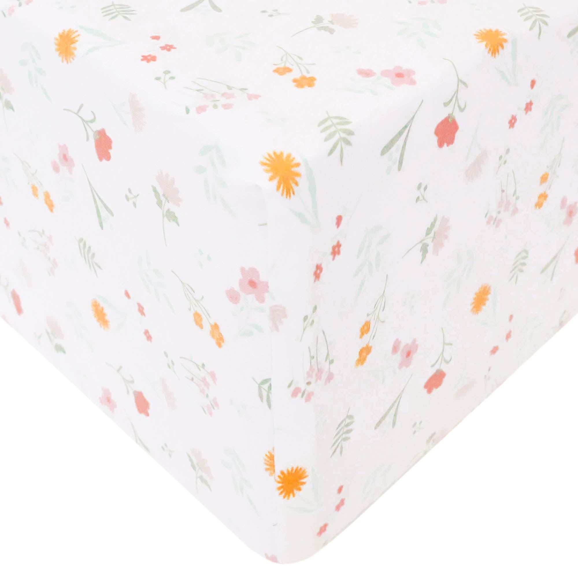 Copper Pearl Mabel crib sheet folded to show premium knit fabric and soft texture.