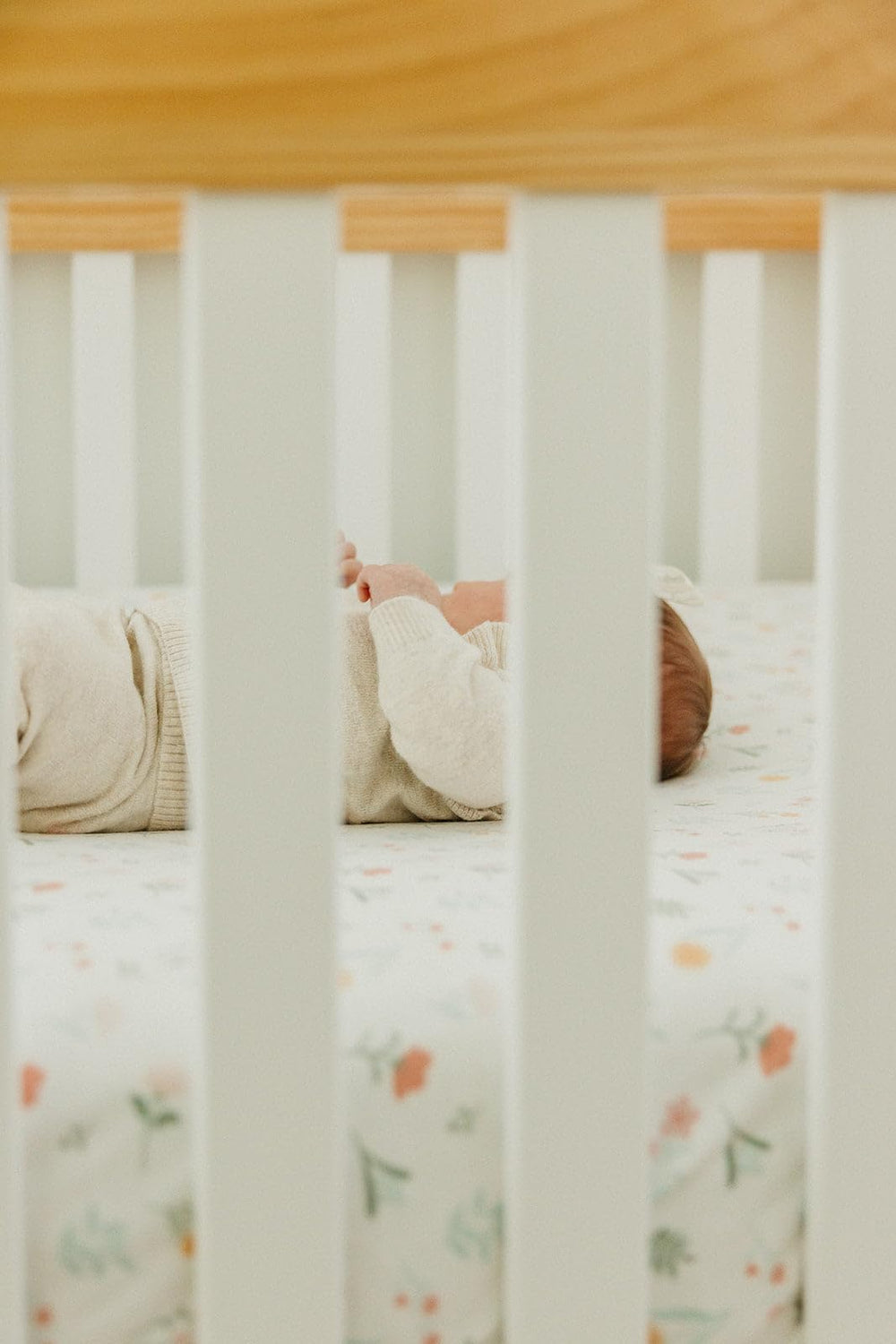 Copper Pearl Mabel crib sheet in gift packaging ideal for baby showers.