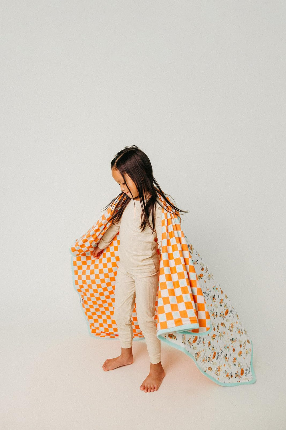 Copper Pearl blanket closeup with Mickey Boo Bash design for nursery style