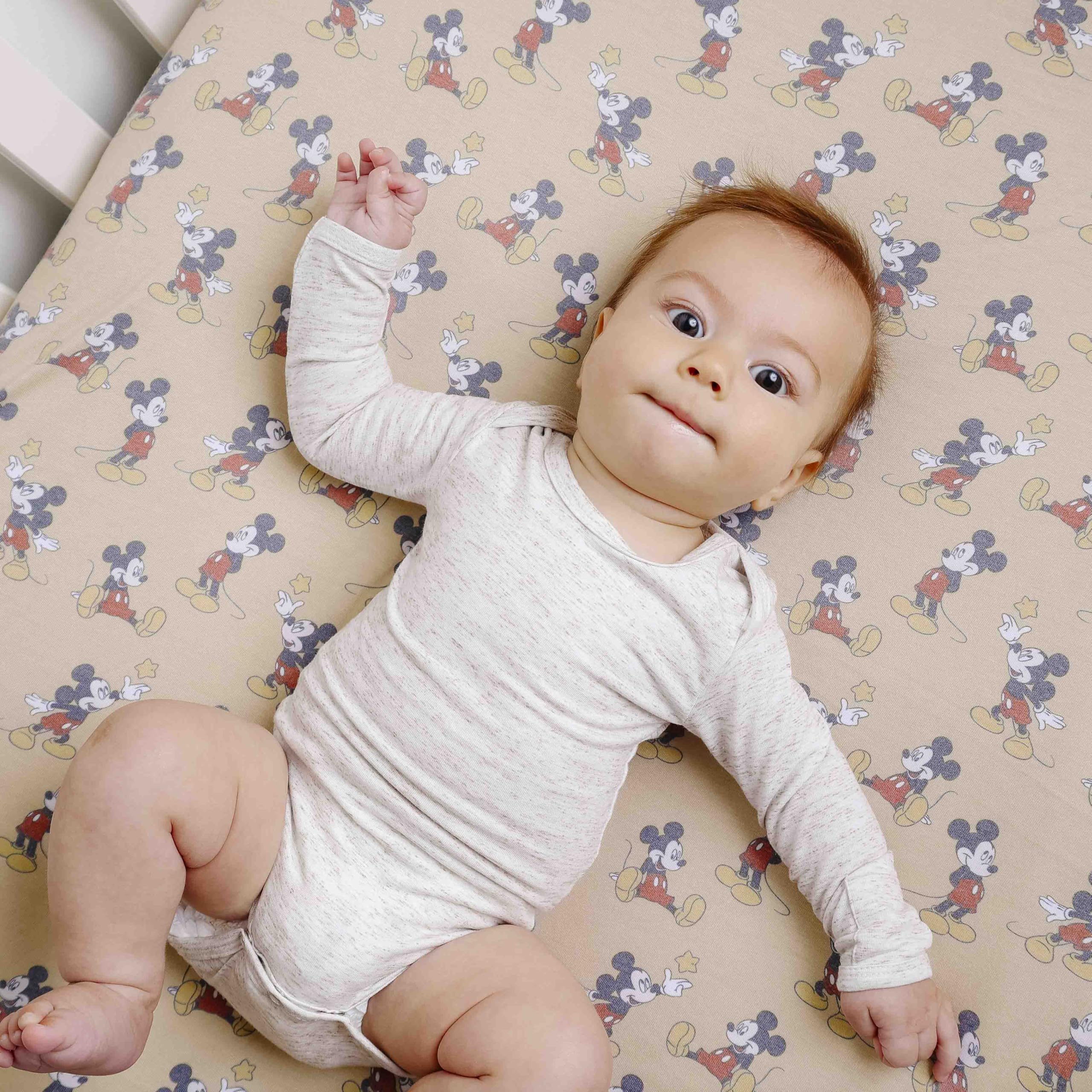 Copper Pearl Mickey Mouse crib sheet with full-elastic edge provides a snug, secure fit.