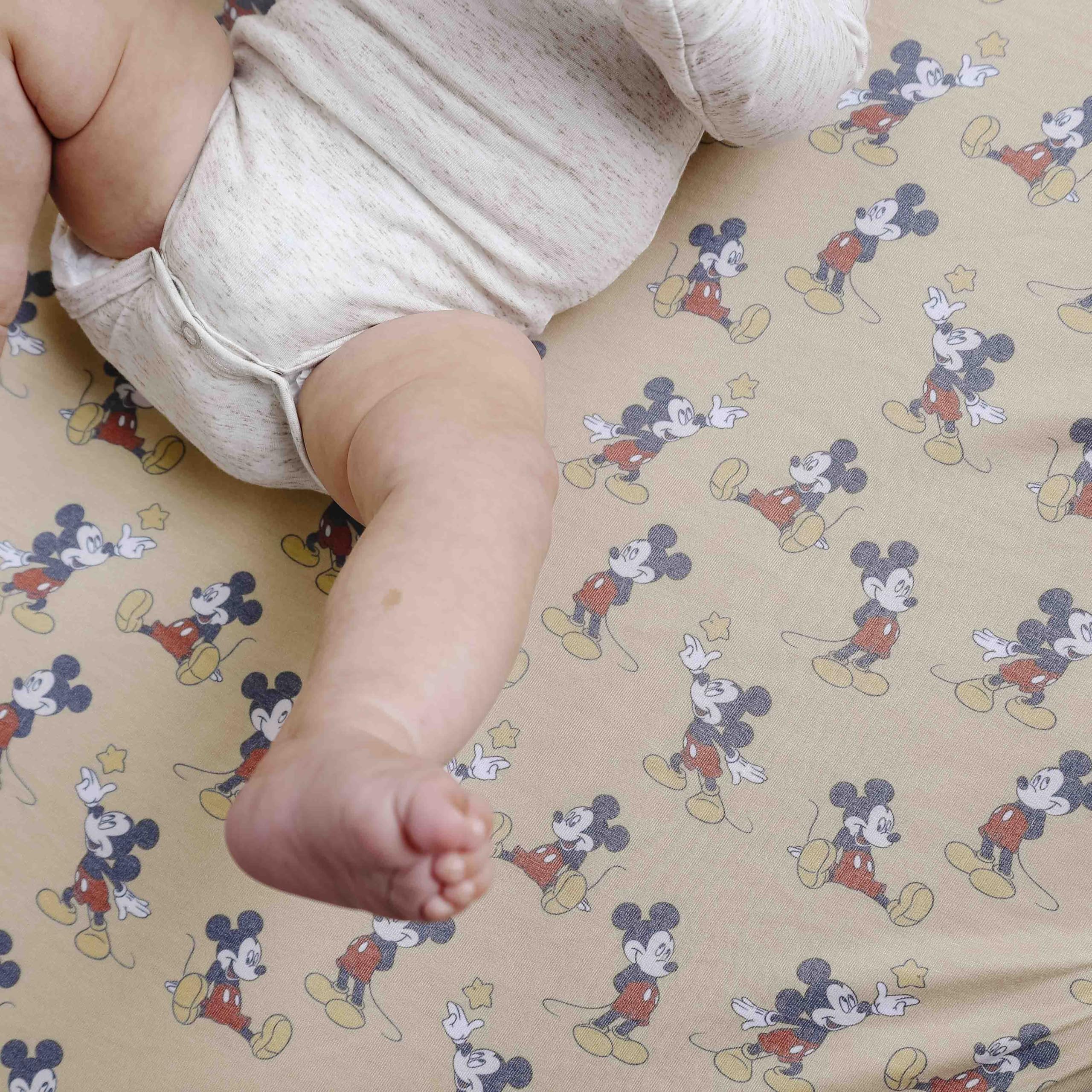 Copper Pearl Mickey Mouse sheet adds modern nursery style to any crib display.