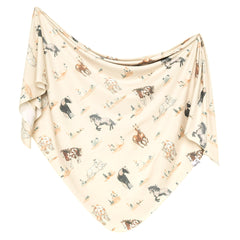 Copper Pearl Montana swaddle blanket folded for gifting and cozy nights