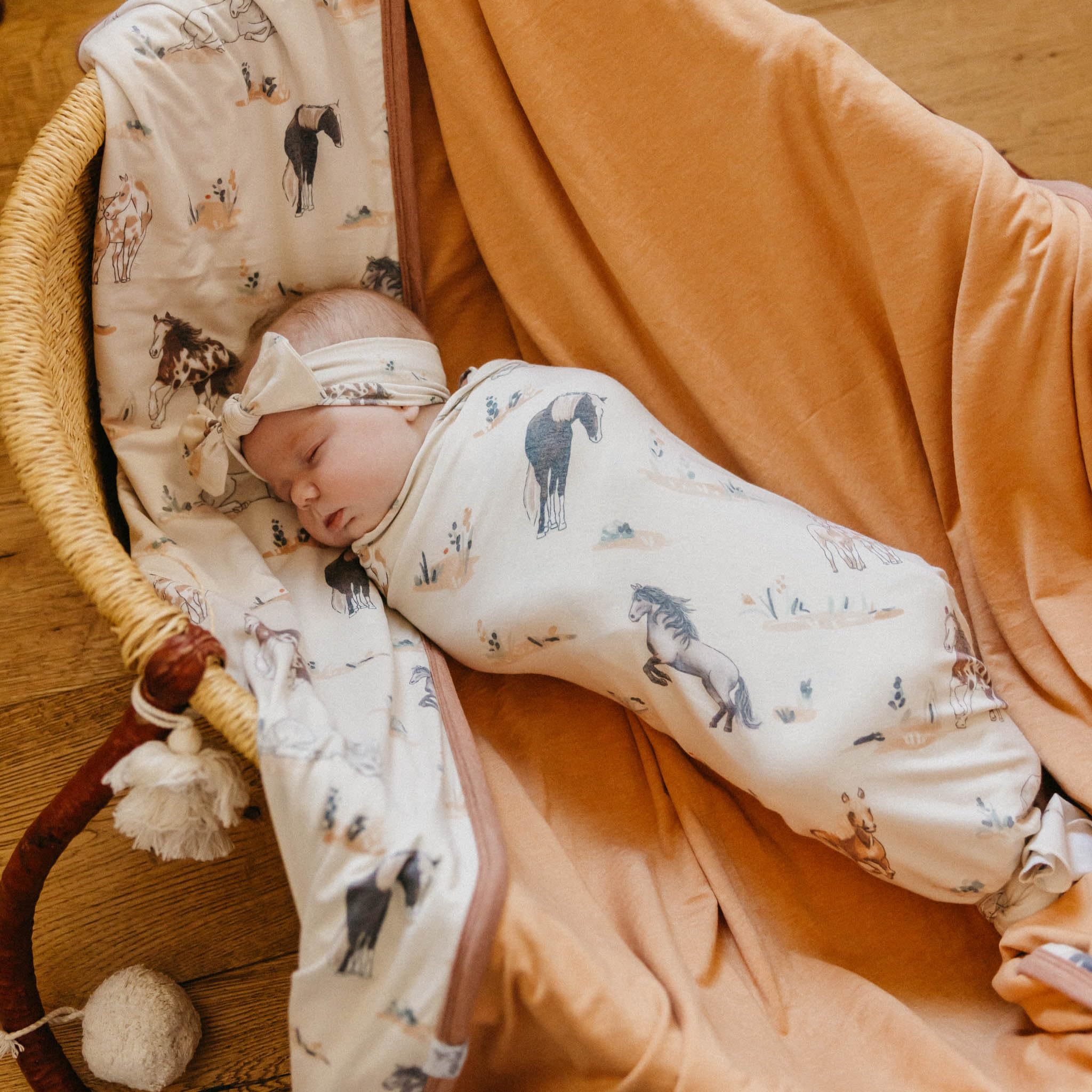 Copper Pearl Montana swaddle during tummy time for comfort and support