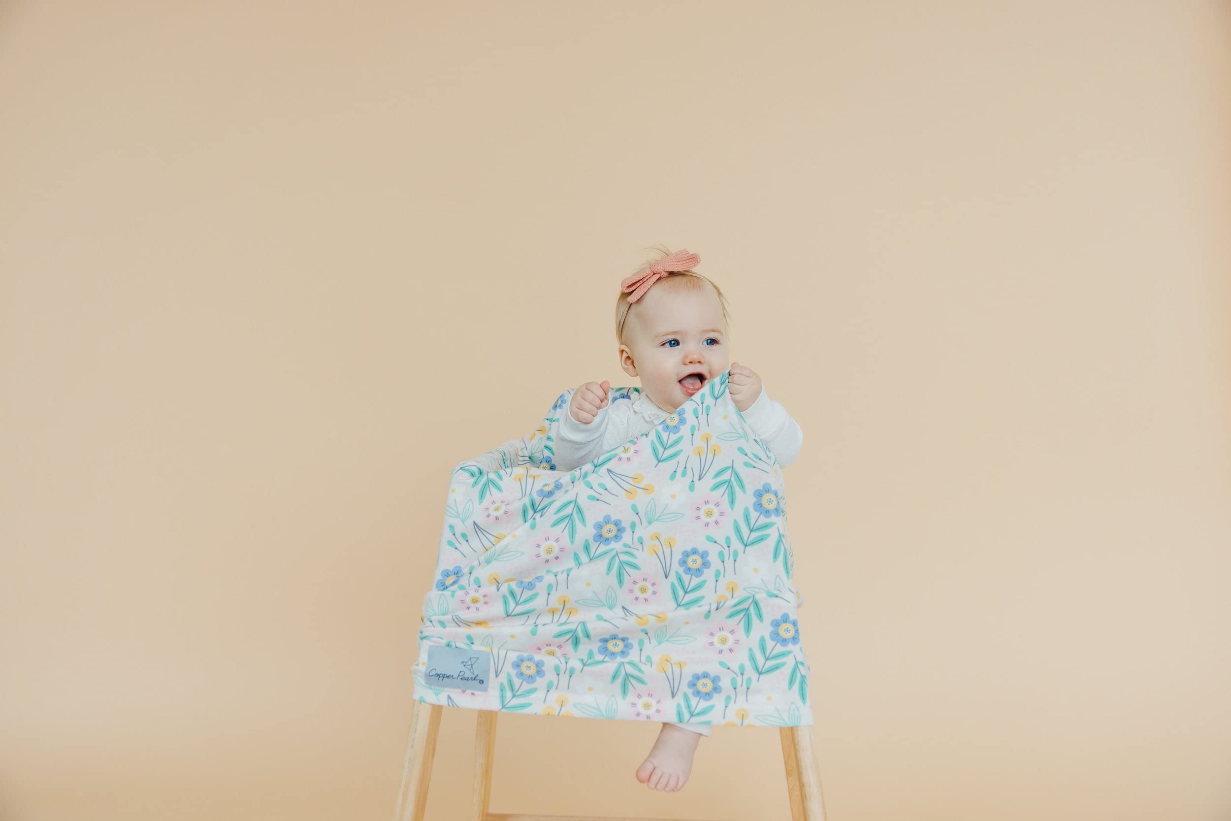 Copper Pearl all-season use cover keeps baby comfortable in varied weather.