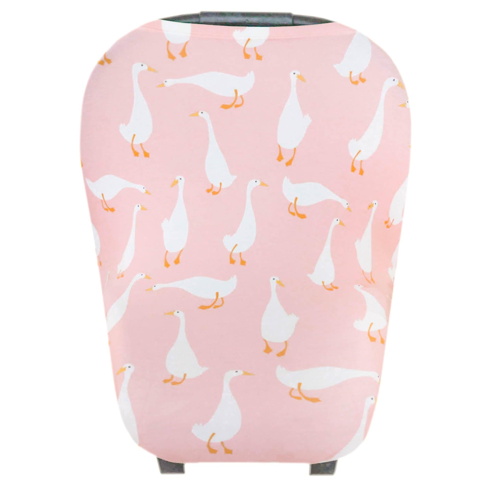 Copper Pearl multi-use cover for car seat providing sun and wind protection on the go