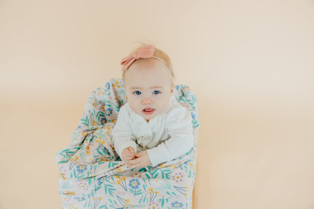 Copper Pearl stylish designs add chic flair to mom’s outfits.