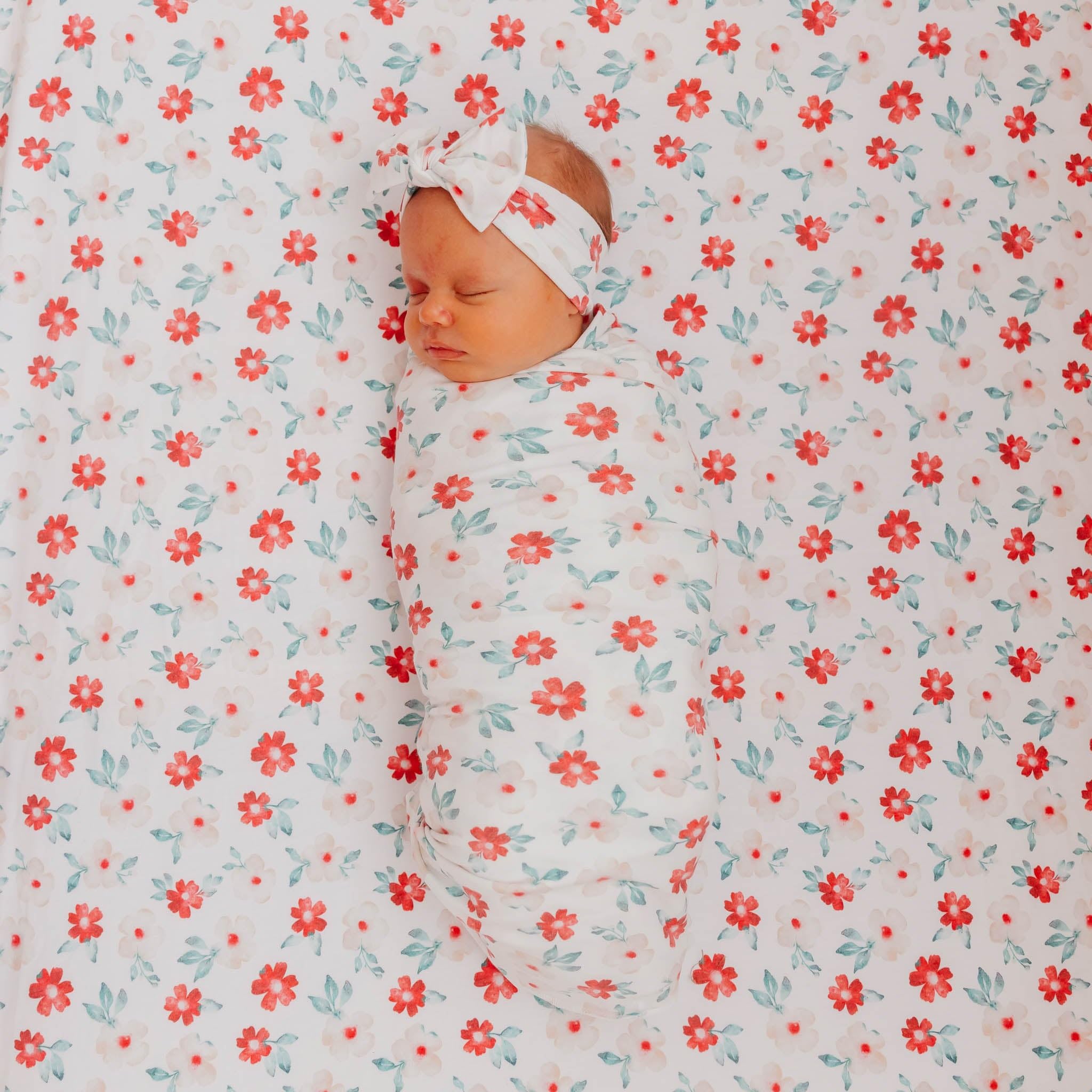 Copper Pearl Noel Knit Headband newborn-fit suits newborns and grows with baby.