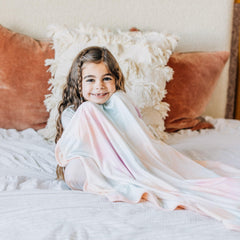 Copper Pearl Nova large premium knit quilt in nursery ambiance demonstrates all-season warmth.