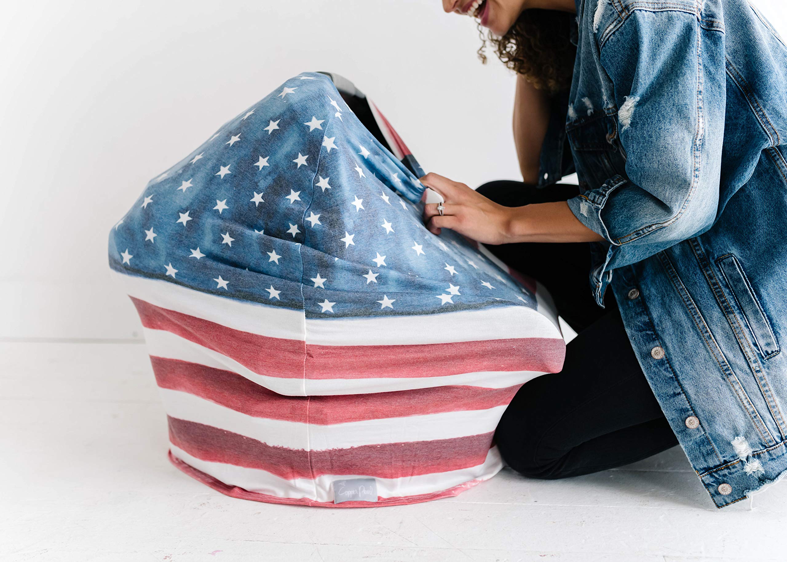 Copper Pearl Patriot all-season design shields baby and caregiver from weather while on the go.