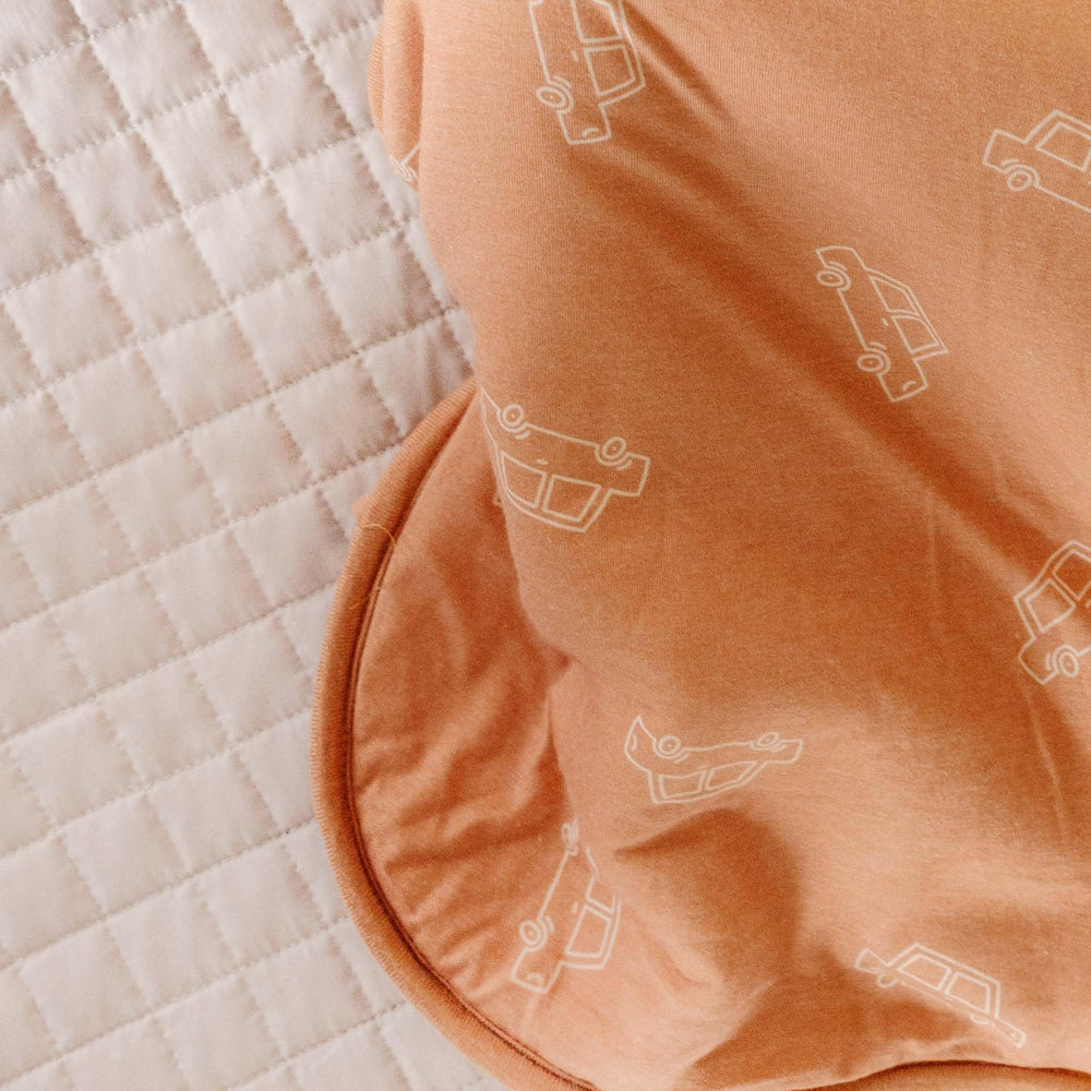 Copper Pearl sleep bag Cooper top-zip close for easy nighttime diaper changes.
