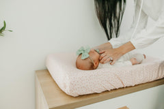 Copper Pearl changing pad cover shown on a pad to keep surfaces tidy and comfortable.