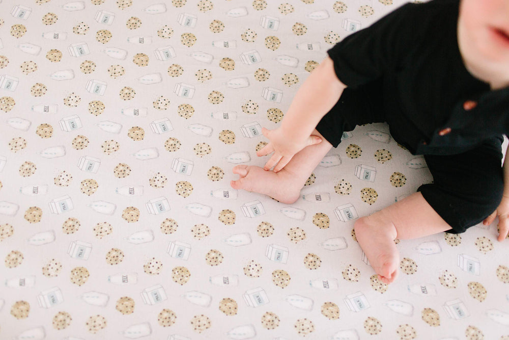 Copper Pearl crib sheet with girl-design shows coordinating hues for nursery styling