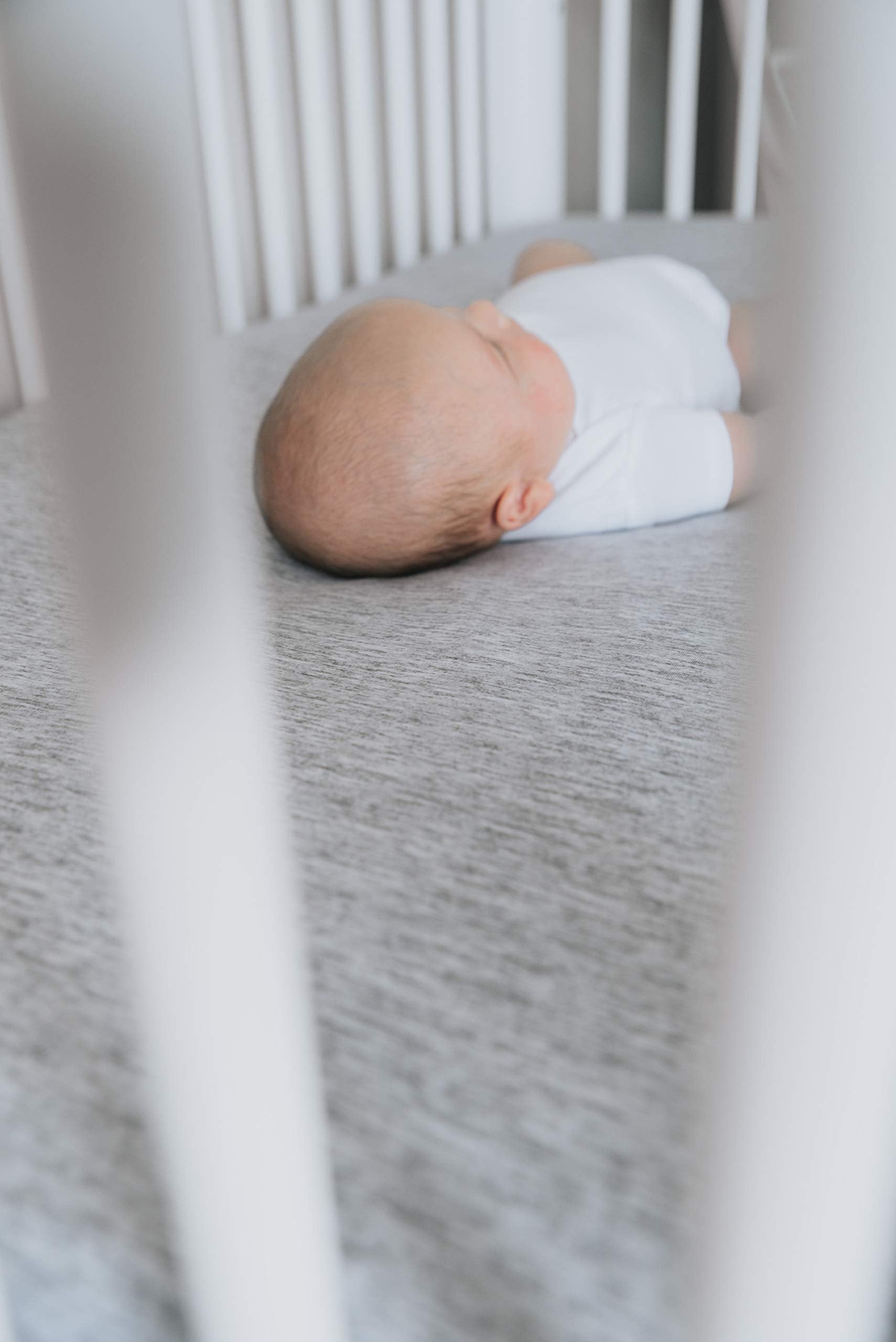 Copper Pearl premium knit crib sheets Asher durable construction remains soft wash after wash.