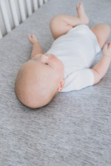 Copper Pearl premium knit crib sheets Asher gift packaging illustrates a ready-to-gift present for baby showers.