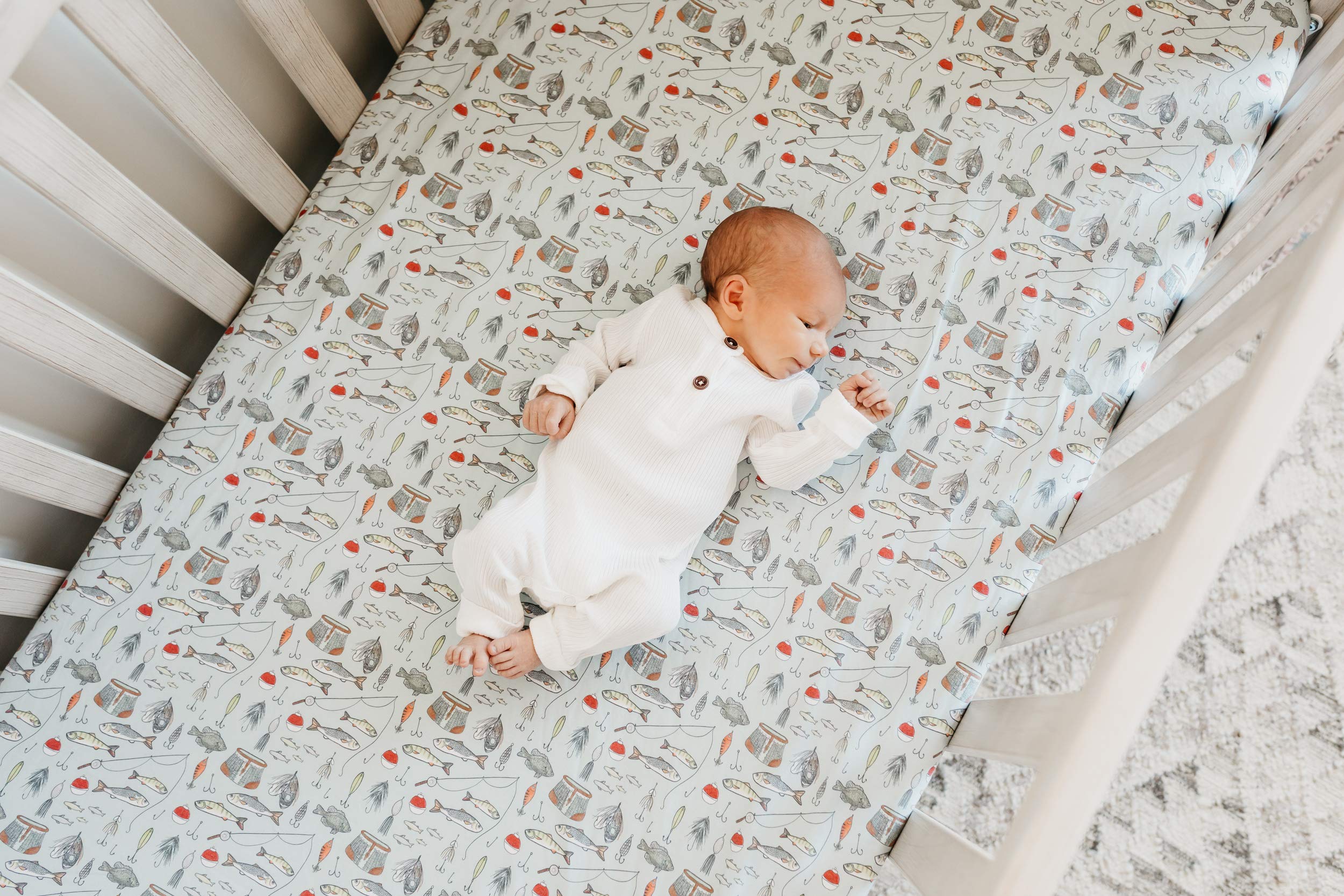 Copper Pearl Trout sheet beside coordinating nursery décor for cohesive styling.