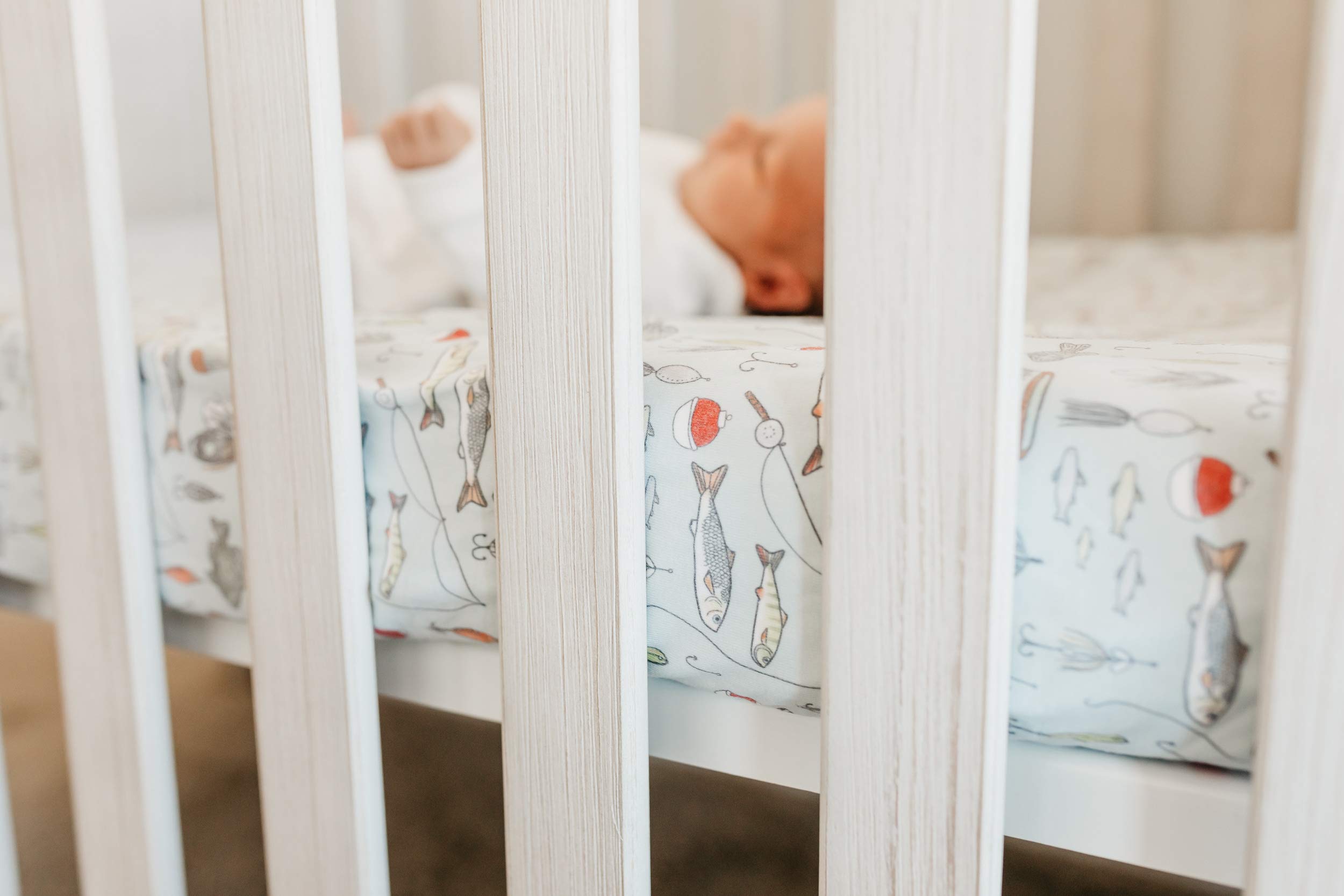 Copper Pearl Trout elastic-edge design provides a clean, secure look on the crib.