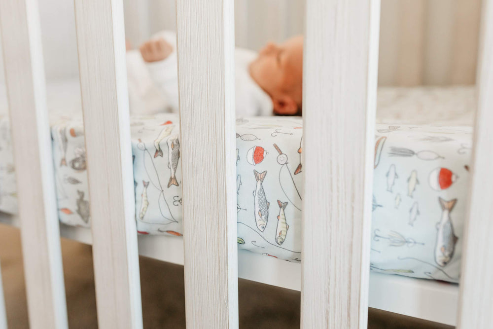 Copper Pearl Trout elastic-edge design provides a clean, secure look on the crib.