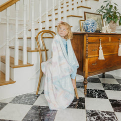 Copper Pearl Princess Palaces quilt flatlay; cozy swaddle and playtime companion