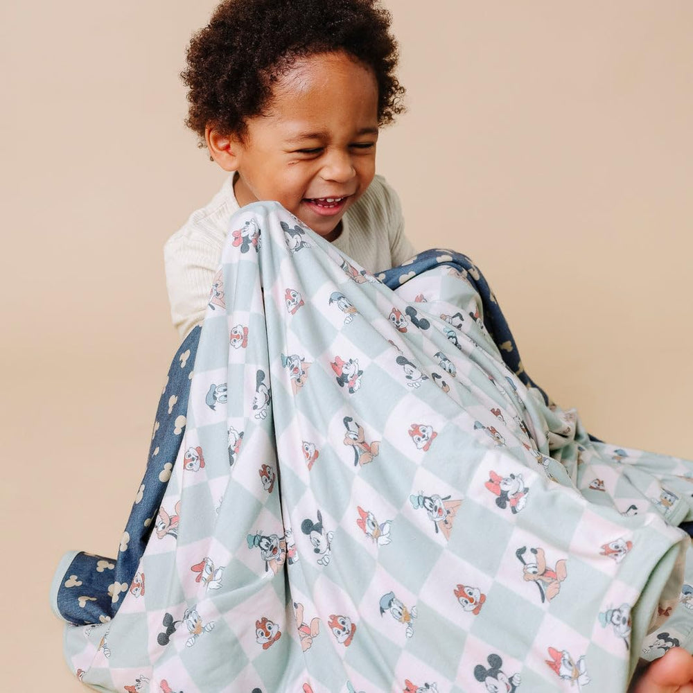 Copper Pearl quilt used as a swaddle or blanket during playtime and tummy time.