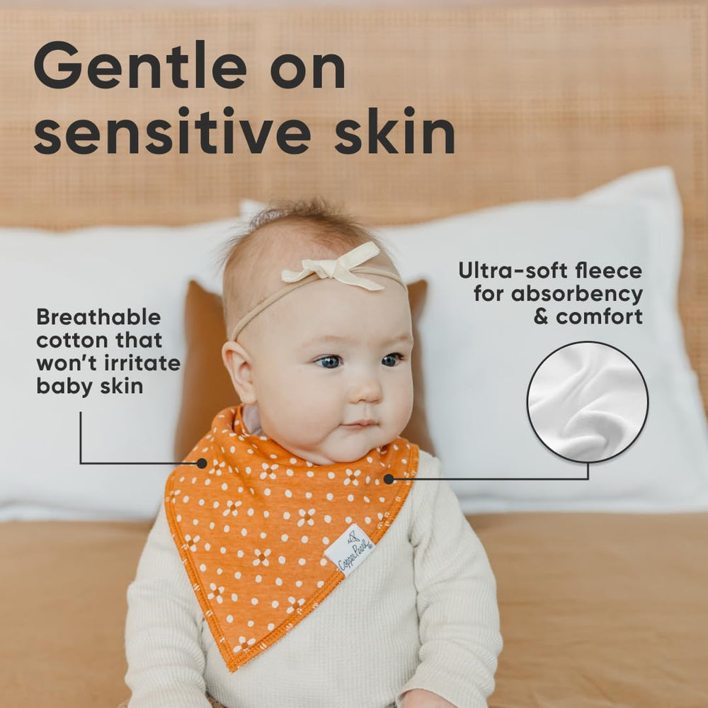 Copper Pearl Rue bibs with front-layer absorption and waterproof backing to keep outfits dry.