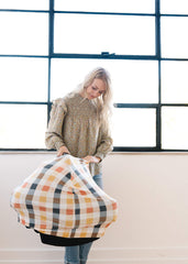Copper Pearl shopping cart cover shields baby from surfaces while shopping.