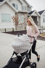 Copper Pearl shopping-cart-cover protects baby during errands while easy to clean.