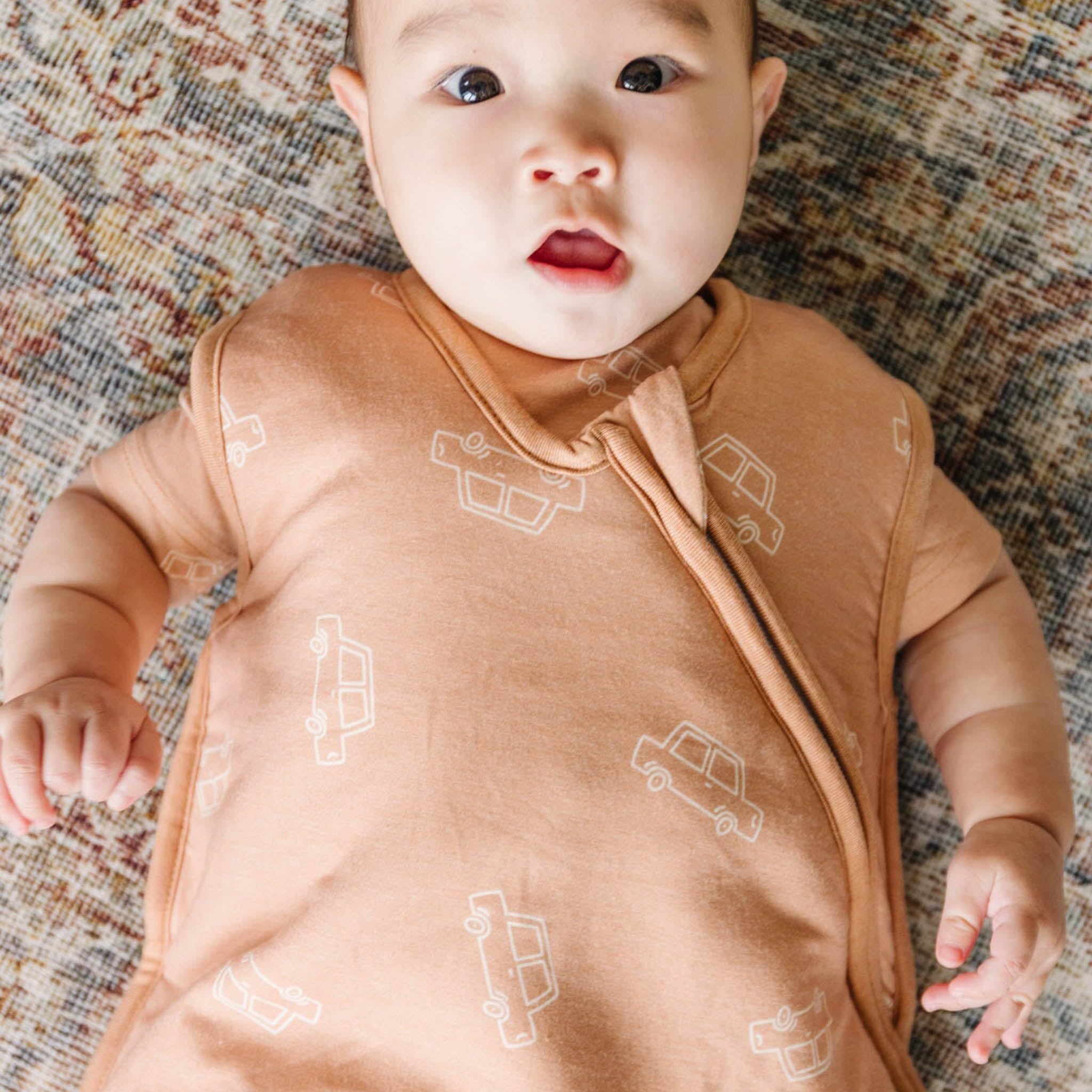 Copper Pearl top-to-bottom zipper enables easy on and off.