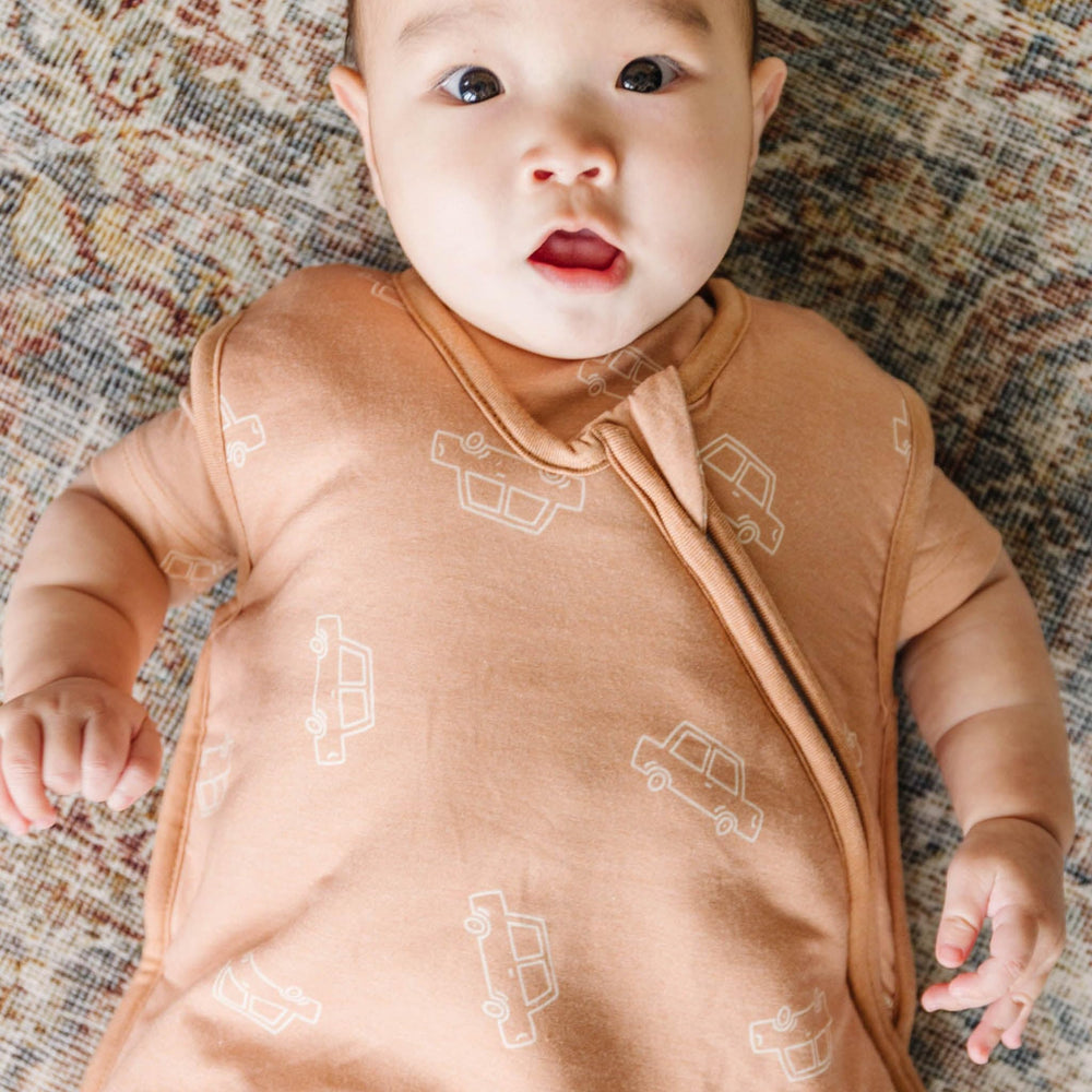 Copper Pearl top-to-bottom zipper enables easy on and off.