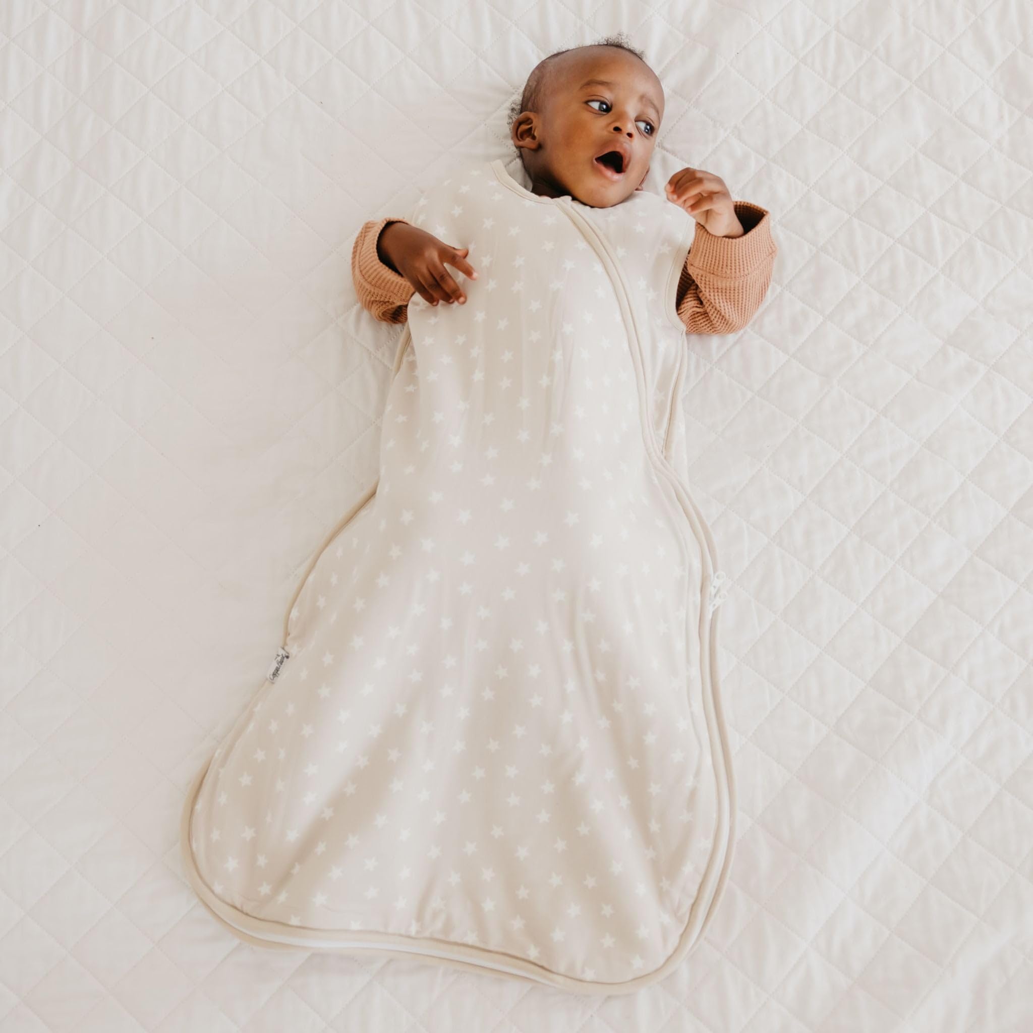 Copper Pearl Sleep Bag Twinkle side view demonstrates flexible fabric for easy movement