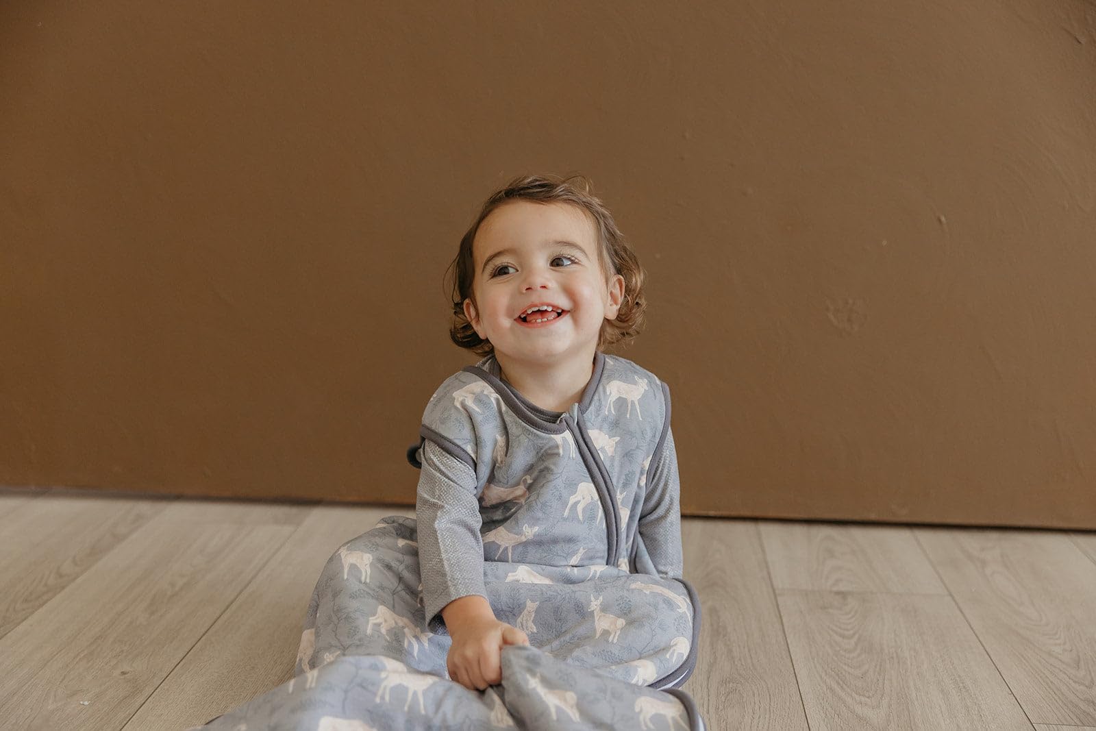 Copper Pearl Sleep Sack Timber tag-free neck minimizes irritation for newborns.
