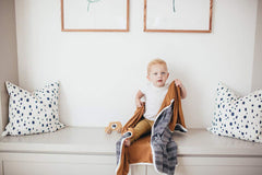 Copper Pearl Soft Baby Quilt Canyon displayed with nursery decor and coordinating patterns