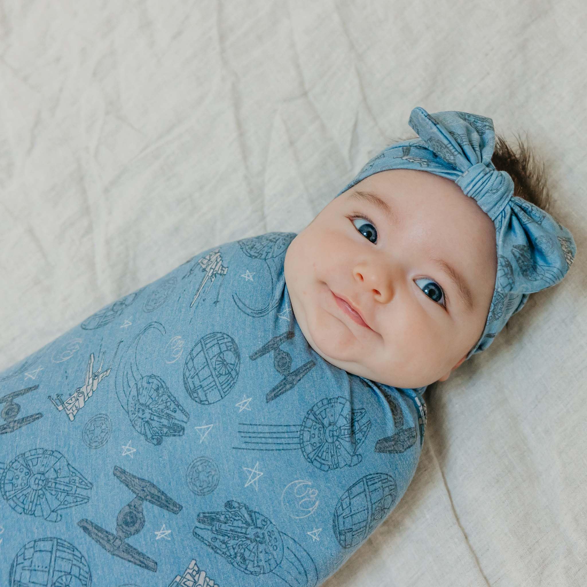 Copper Pearl Starships blanket laid flat for versatile playtime and growth with baby